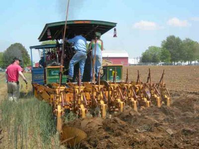 Sister Plows by on Advance-Rumely as Sibling on Keck-Gonnerman Gets Stuck Image